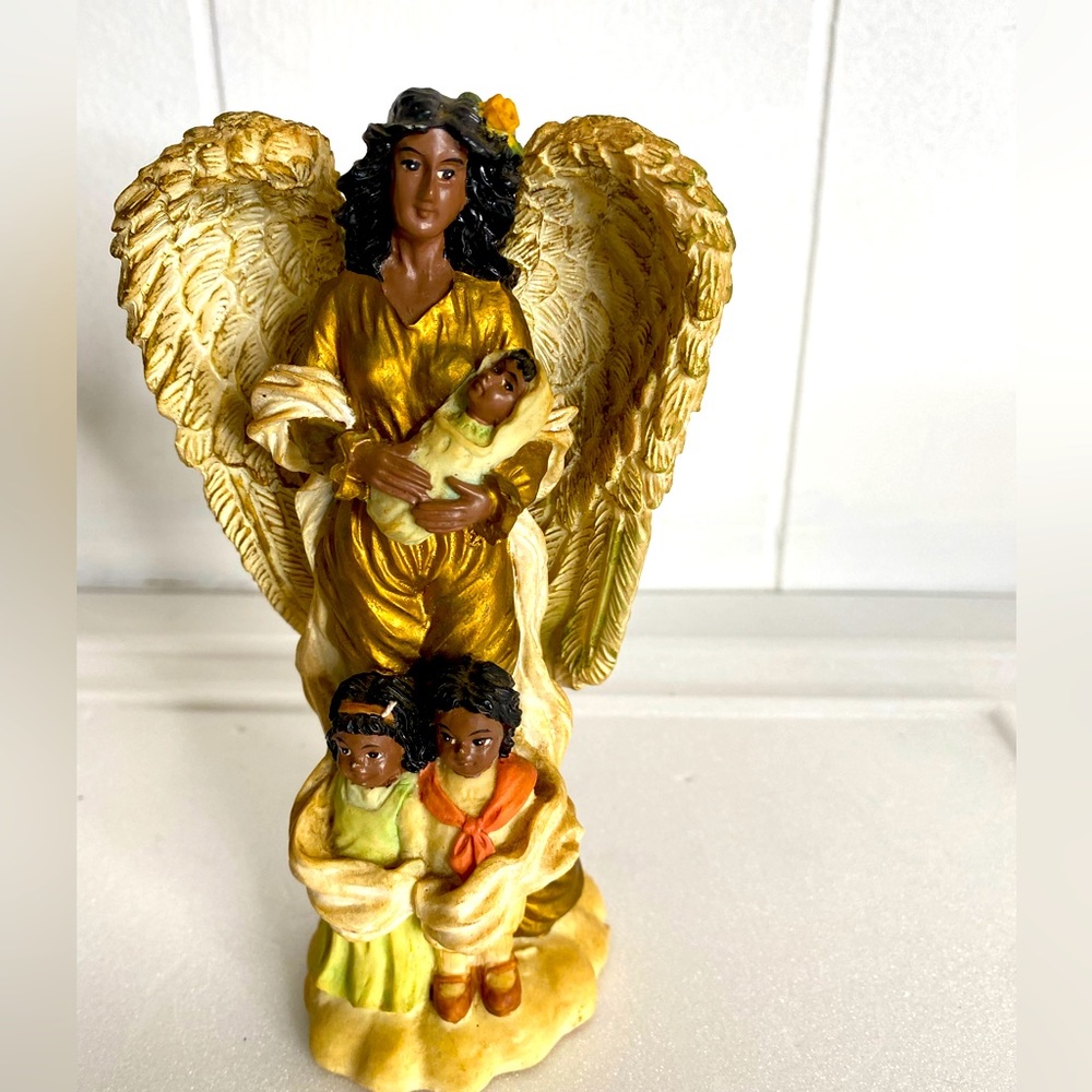 1996 Angel Mother and her three kids